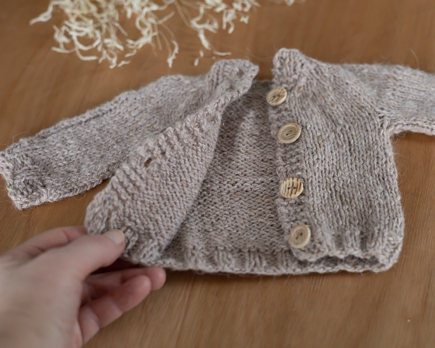 Beige hand-knitted cardigan