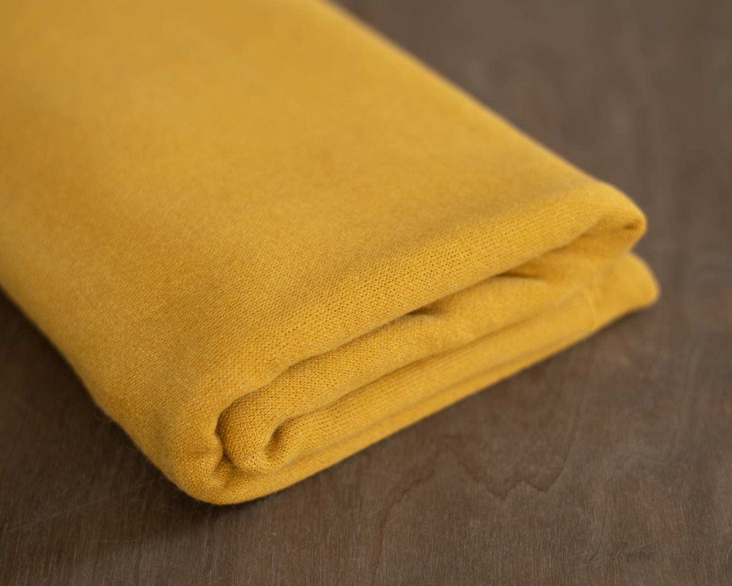 Mustár színű, kötött, vastag babzsák takaró