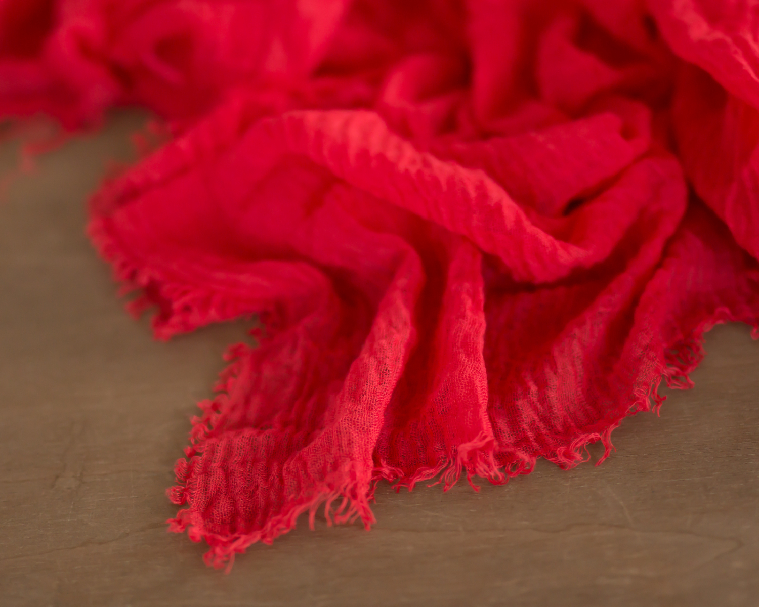 Light red fringed scarf